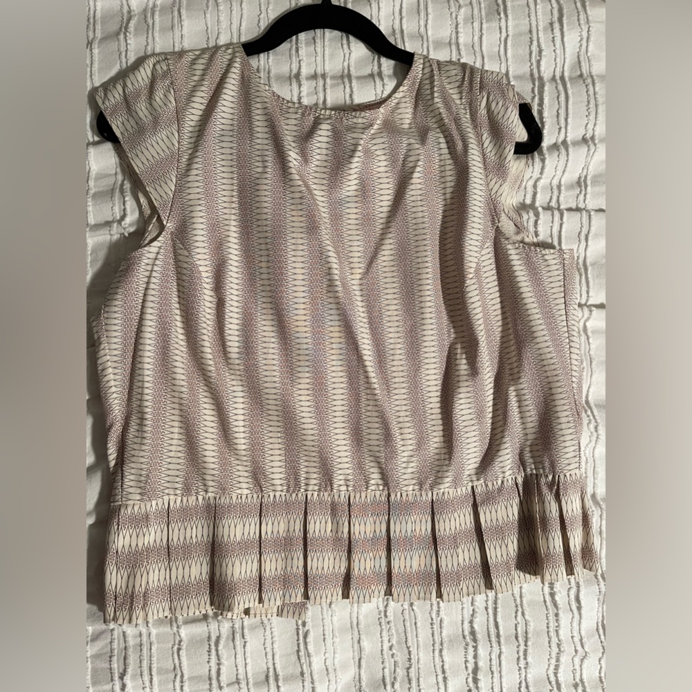 Cap sleeve blouse with button up the back